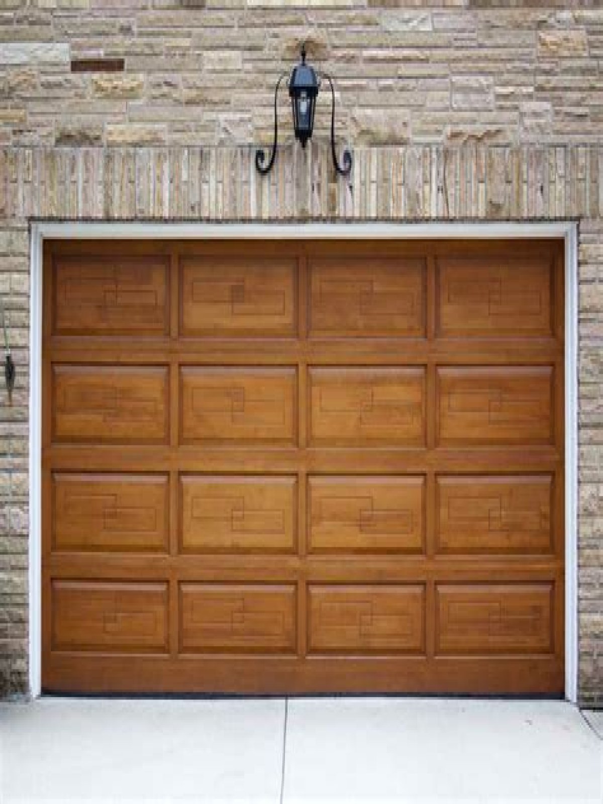 How much does a solid wood garage door cost?